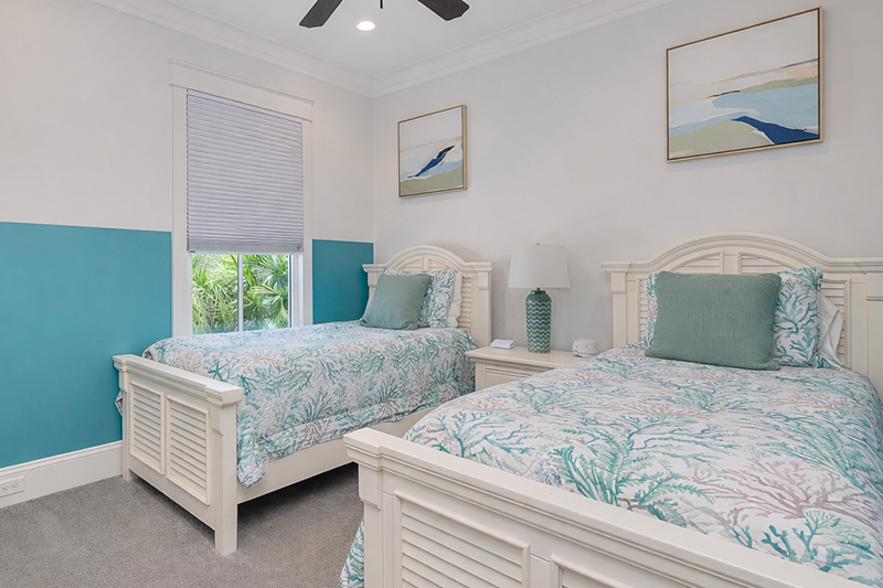 Twin bedroom with coastal decor - Seaside Retreat